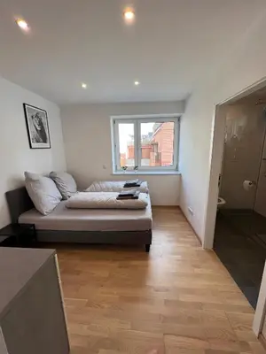 Ein Sitzbereich in der Unterkunft Gemütliches Studio-Apartment in Karlsruhe Neureut - Nähe Uni-KIT-Messe, Fußbodenheizung, Regendusche, Waschmaschine, Stellplatz
