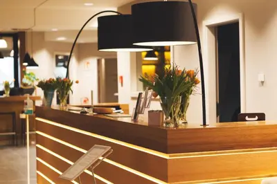 Ein Restaurant oder anderes Speiselokal in der Unterkunft Weinhotel Kaisergarten