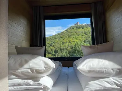 Ein Bett oder Betten in einem Zimmer der Unterkunft Bergchalet auf Stelzen