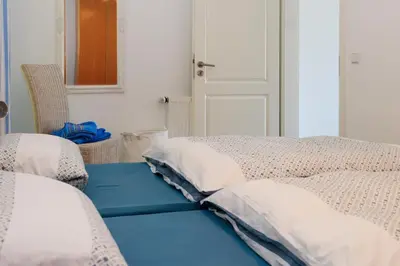 Ein Bett oder Betten in einem Zimmer der Unterkunft Ferienwohnung Kästle