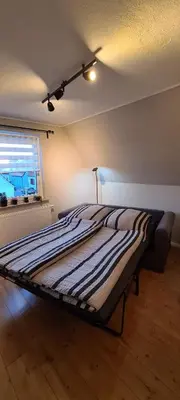Ein Bett oder Betten in einem Zimmer der Unterkunft Gouda