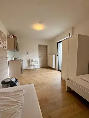Ein Bett oder Betten in einem Zimmer der Unterkunft kleine und charmante Monteurs Unterkunft C