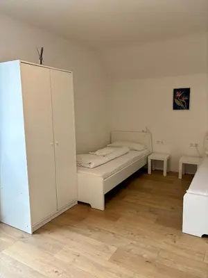 Ein Bett oder Betten in einem Zimmer der Unterkunft kleine und charmante Monteurs Unterkunft C