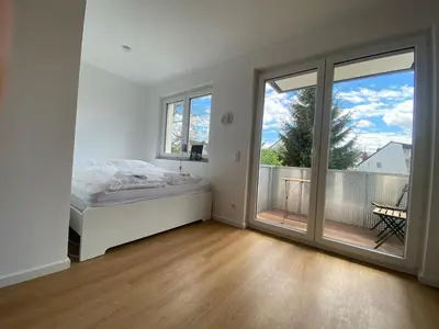 Ein Bett oder Betten in einem Zimmer der Unterkunft LUX Apartments