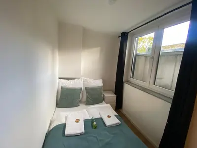 Ein Bett oder Betten in einem Zimmer der Unterkunft LUX Apartments