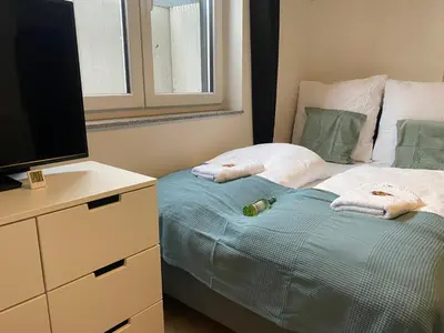 Ein Bett oder Betten in einem Zimmer der Unterkunft LUX Apartments