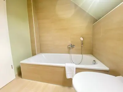 Ein Badezimmer in der Unterkunft LUX Apartments