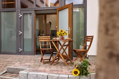 Ein Patio oder anderer Außenbereich in der Unterkunft Ajko Homes - Loft-Apartment mit Parkplatz bei Heidelberg