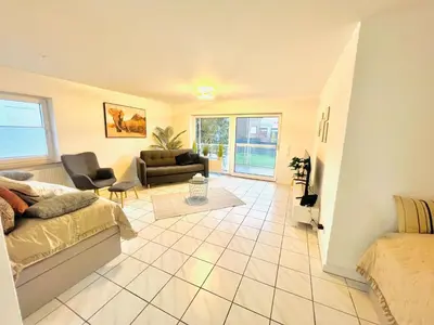 Ein Sitzbereich in der Unterkunft Homely - modern - für 4 - Boxspringbetten - Internet