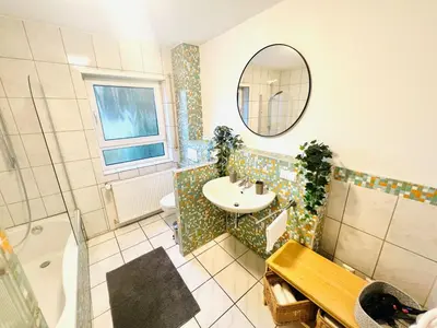 Ein Badezimmer in der Unterkunft Homely - modern - für 4 - Boxspringbetten - Internet