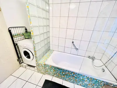 Ein Badezimmer in der Unterkunft Homely - modern - für 4 - Boxspringbetten - Internet
