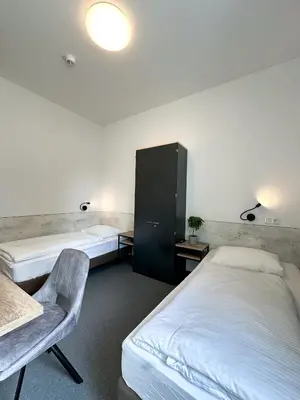 Ein Bett oder Betten in einem Zimmer der Unterkunft Longhouse Aparthotel