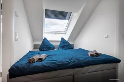 Ein Bett oder Betten in einem Zimmer der Unterkunft XXL Design-Appartement Artdesign - 8 Pers - nähe Speyer Mannheim Heidelberg