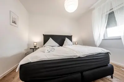 Ein Bett oder Betten in einem Zimmer der Unterkunft XXL Design-Appartement Artdesign - 8 Pers - nähe Speyer Mannheim Heidelberg
