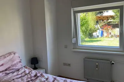 Ein Bett oder Betten in einem Zimmer der Unterkunft Smoke free small apartement with Garden View