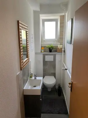 Ein Badezimmer in der Unterkunft Kleines Apartment mit begehbarer Dusche im Schlafzimmer