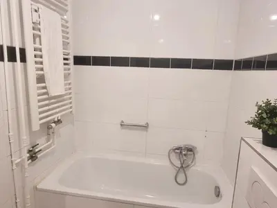 Ein Badezimmer in der Unterkunft Spacious 4-Bedroom Apartment with Balcony near Frankfurt