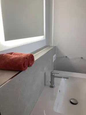 Ein Badezimmer in der Unterkunft Alma - Art Luxus Modern Ambiente