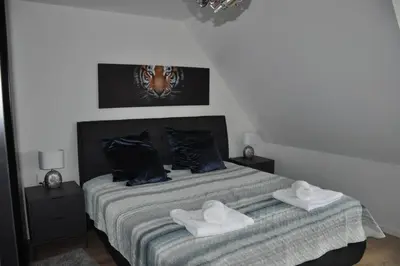 Ein Bett oder Betten in einem Zimmer der Unterkunft Neubau, Luxus, 3-Zi Wohn für KaffeeGenießer