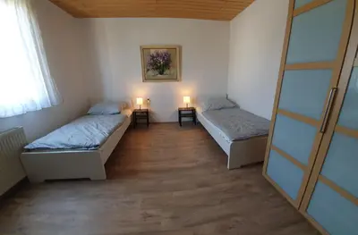 Ein Bett oder Betten in einem Zimmer der Unterkunft Ferienhaus Sommer mit Klimaanlage