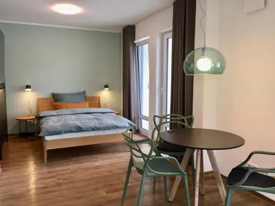 Ein Bett oder Betten in einem Zimmer der Unterkunft aparthaus felizitas