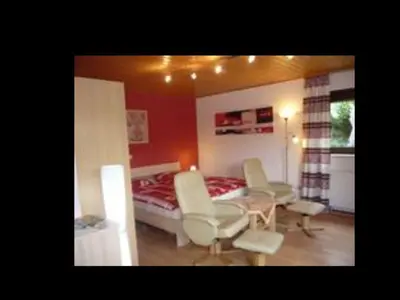 Ein Bett oder Betten in einem Zimmer der Unterkunft „Ferienwohnung Anni“