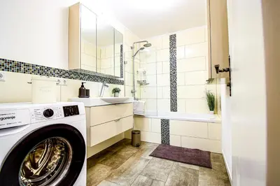 Ein Badezimmer in der Unterkunft SCANDiC-Apartment - Balkony & Garage, 3Z, 80m2