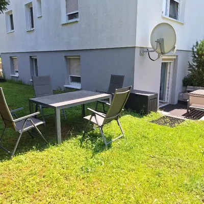 Ein Garten an der Unterkunft Schöni´s Zimmer