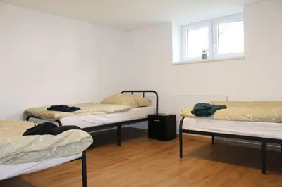 Ein Bett oder Betten in einem Zimmer der Unterkunft Ruhig gelegenes Apartment