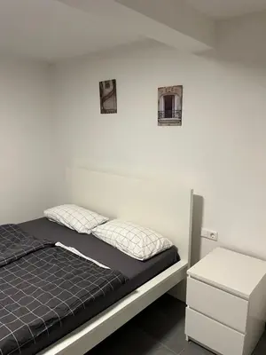 Ein Bett oder Betten in einem Zimmer der Unterkunft Home-for-you-Ferienwohnung Monteurwohnung