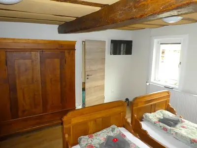 Ein Bett oder Betten in einem Zimmer der Unterkunft Alte Schreinerei