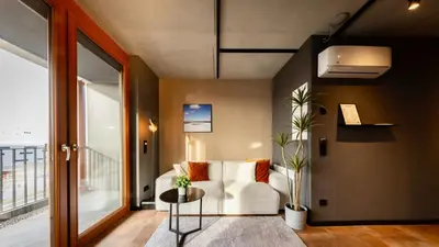 Ein Sitzbereich in der Unterkunft Stadthaus Neckarsulm serviced apartments – Stadthaus Heiner
