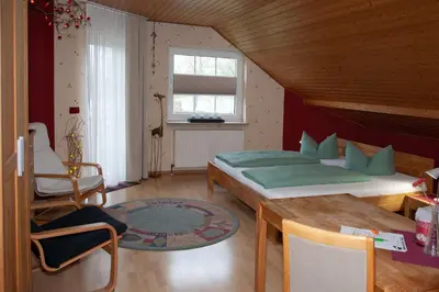 Ein Bett oder Betten in einem Zimmer der Unterkunft Chefs Gästezimmer