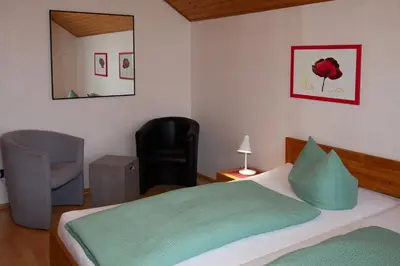 Ein Bett oder Betten in einem Zimmer der Unterkunft Chefs Gästezimmer