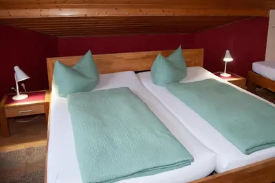 Ein Bett oder Betten in einem Zimmer der Unterkunft Chefs Gästezimmer