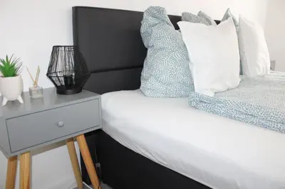 Ein Bett oder Betten in einem Zimmer der Unterkunft Ruhiges & schickes 4 Zi-Apartment