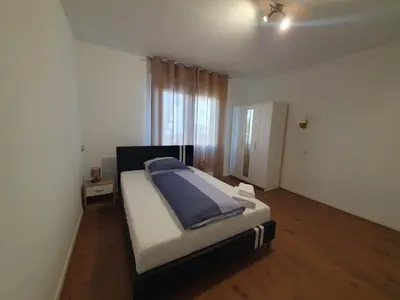 Ein Bett oder Betten in einem Zimmer der Unterkunft Gemütliches Privatzimmer an der Uniklinik Mainz. Sehr zentral