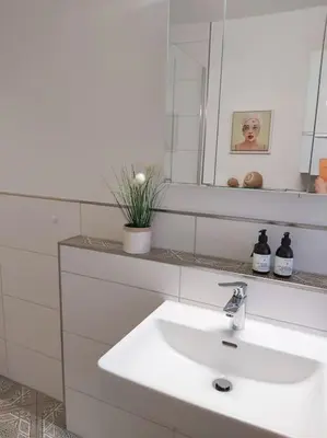 Ein Badezimmer in der Unterkunft Wohnung Elisabeth - Parkblick - Am Buhl'schen Park 40 - zentrumsnah