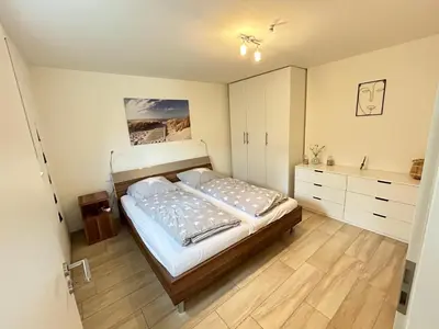 Ein Bett oder Betten in einem Zimmer der Unterkunft 2 Zimmer Traum mit Terrasse am Kocher Jagst Radweg nähe Heilbronn