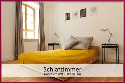 Ein Bett oder Betten in einem Zimmer der Unterkunft Neue90 - Fewo Steinacker, Weinstraße Kallstadt Pfalz, 2ZKB - keine Monteure