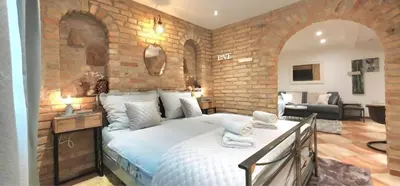 Ein Bett oder Betten in einem Zimmer der Unterkunft Altstadt Speyer