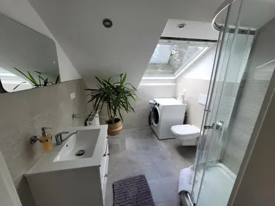 Ein Badezimmer in der Unterkunft Schöne FeWo nähe Schwetzingen-Hockenheim