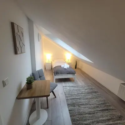 Ein Bett oder Betten in einem Zimmer der Unterkunft Schöne FeWo nähe Schwetzingen-Hockenheim