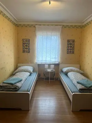 Ein Bett oder Betten in einem Zimmer der Unterkunft Monteurwohnung Niefern