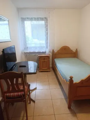 Ein Bett oder Betten in einem Zimmer der Unterkunft Ruhe-Nescht
