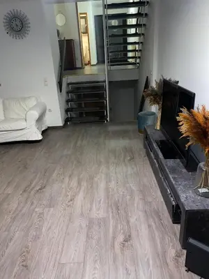 Ein Sitzbereich in der Unterkunft Mc Home Pfungstadt