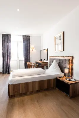 Ein Bett oder Betten in einem Zimmer der Unterkunft Eventlocation & Hotel Schloss Neuburg