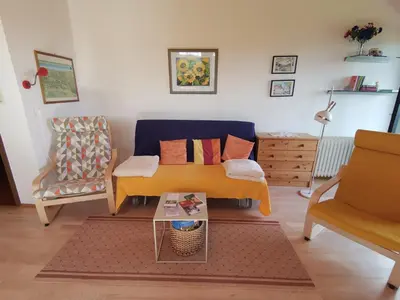 Ein Sitzbereich in der Unterkunft Ferienwohnung am Sonnenberg
