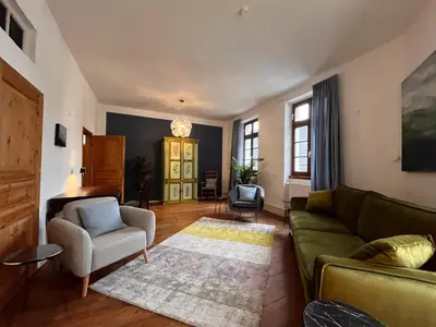 Ein Sitzbereich in der Unterkunft Ferienwohnung Unterm Schloß