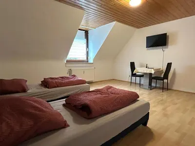 Ein Bett oder Betten in einem Zimmer der Unterkunft Komfortables Apartment